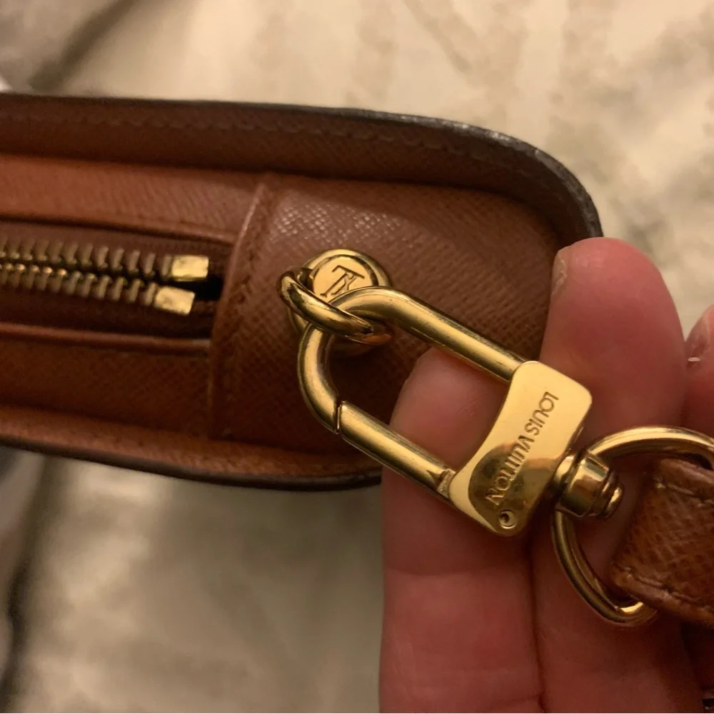 Louis Vuitton Orsay Clutch - Picture 9 of 13